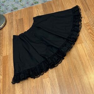 Elegant black floral lace trim circle skirt. Size L.